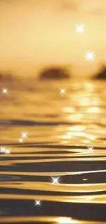 Golden sunset over water with stars.