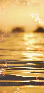 Peaceful golden sunset over ocean with sparkling water.