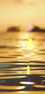 Golden ocean sunset with artistic icons on calm water surface.