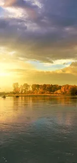 Golden sunset over a tranquil river with radiant light.