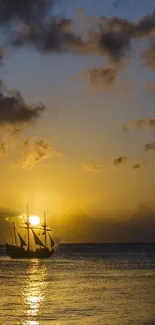 A majestic ship sailing during a vibrant, golden sunset over calm ocean waters.