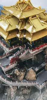 Golden temple on misty mountain peak.