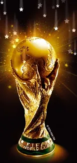 Golden World Cup trophy glowing in the dark wallpaper.