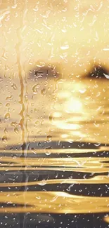 Golden water with raindrops mobile wallpaper.