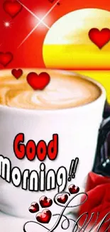 Coffee cup with good morning text and hearts on a vibrant sunrise background.