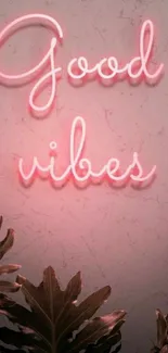 Good vibes neon pink wallpaper with leaves.