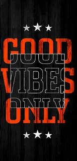 Good Vibes Only text on black wood background.