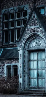 Gothic building with large wooden door, showcasing intricate stonework and vintage design.