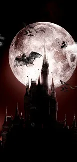 Gothic castle silhouette with bats flying under a full moon and dark clouds.