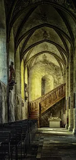 Gothic cathedral interior with arches and a staircase, creating a serene atmosphere.