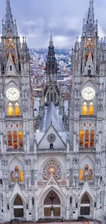 Gothic cathedral with clock towers against a cloudy cityscape.