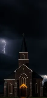 A Gothic church illuminated by lightning on a dark, stormy night.