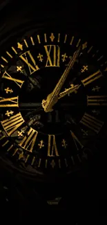 Gothic clock with gold accents on dark mobile wallpaper.