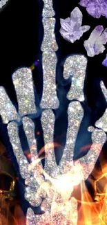 Crystal skeleton hand with skulls and purple crystals on a dark background.