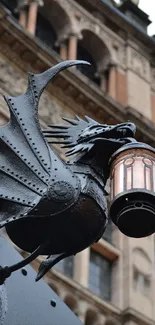 Gothic dragon lamp against historical architecture.