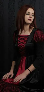 Gothic woman in black and red dress.