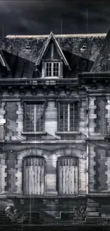 Gothic mansion under a rainy dark sky.