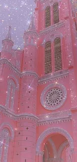 Gothic pink church with stars at dusk.