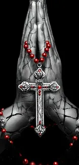 Gothic wallpaper with silver cross and red beads over cracked stone texture.