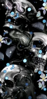 Gothic skulls with floral and butterfly accents on a black background.