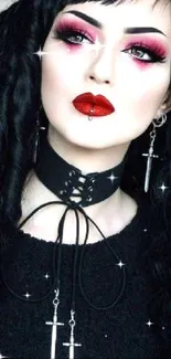 Gothic style portrait with bold makeup and dark curls.