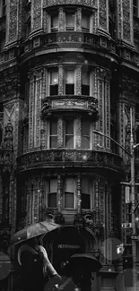 Gothic urban street scene with ornate building facade in monochrome.