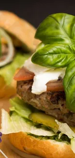 A close-up of gourmet burgers with basil leaves.