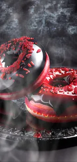 Gourmet red and black glazed donuts on dark background.