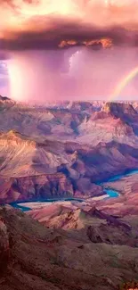 Vibrant Grand Canyon with rainbow and dramatic desert landscape.