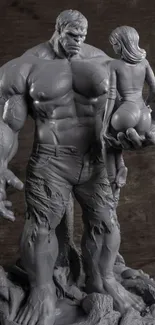 Gray Hulk sculpture with woman figure.