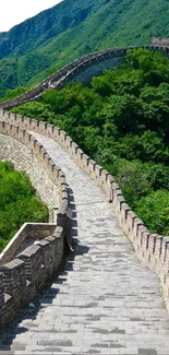 Scenic view of the Great Wall of China with green mountains.