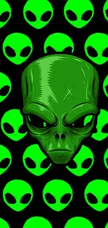 Vibrant green alien faces pattern wallpaper.