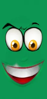 Playful green cartoon face with bright eyes and a wide smile on a mobile wallpaper.