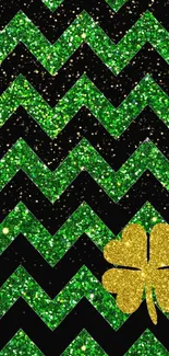 Green glitter chevron pattern with gold shamrock on black background.