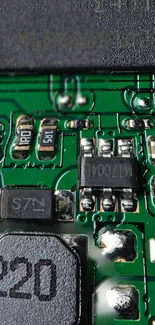 High-resolution close-up of a green circuit board with detailed components.