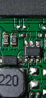 Close-up of detailed green circuit board with electronic components.