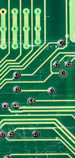 Green circuit board wallpaper featuring electronic paths and pins.