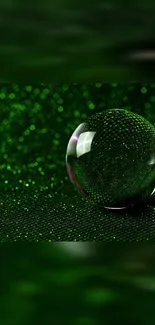 A stunning green crystal sphere with abstract background for mobile wallpaper.