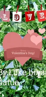 Green gemstone Valentine’s wallpaper with love theme and heart design.