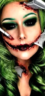 Green-haired figure horror themed wallpaper with dramatic makeup and blades.