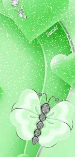 Mint green wallpaper with hearts and jeweled butterfly design.