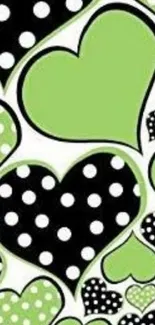 Green and black heart pattern wallpaper with polka dots.