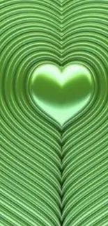 Green metallic heart with abstract design on wallpaper.