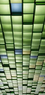 Vibrant green mosaic tile phone wallpaper with abstract pattern.