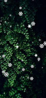 Green leaves with white snowflakes mobile wallpaper.