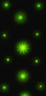 Green starry wallpaper with black background.