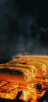Grilled corn on barbecue over flames.