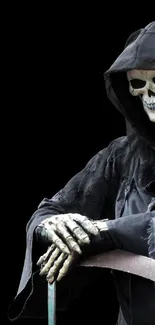 Grim Reaper with scythe on dark background, perfect for gothic mobile wallpaper.