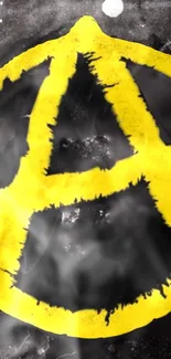 Yellow anarchy symbol on dark smoky background wallpaper.