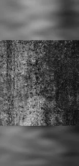 Grunge black textured mobile wallpaper with steel pattern.